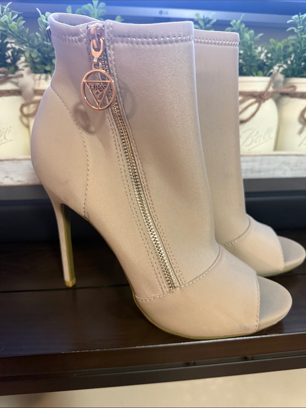 Guess Nude Stretch Peep-Toe Ankle Boot with Gold Logo Zipper